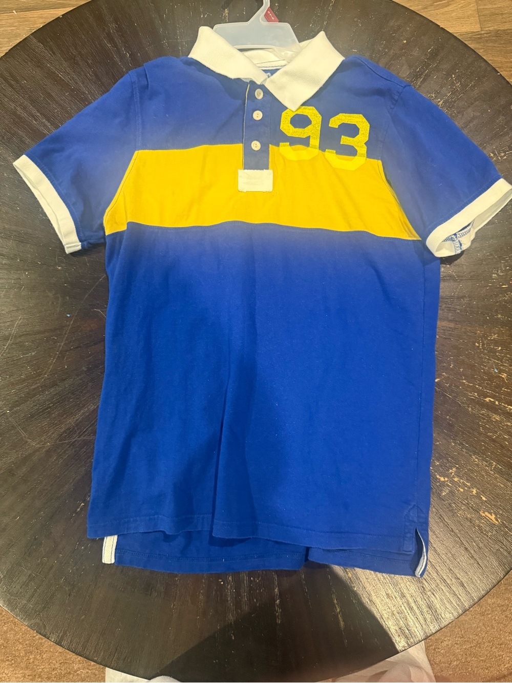 American Rag Blue and Yellow Polo Shirt with '93 Patch